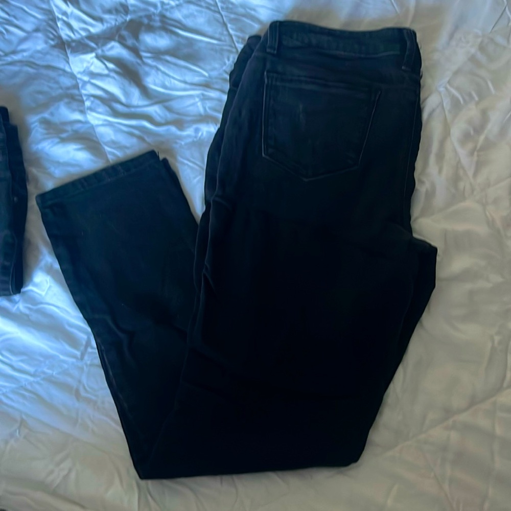 Size 15 black pants. Comfy. Stretch. Good fit.